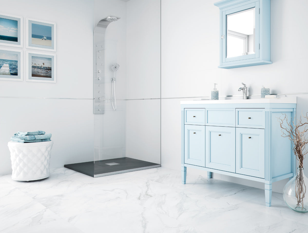Modern bathroom with light blue vanity and shower area