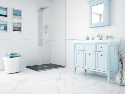 Modern bathroom with light blue vanity and shower area