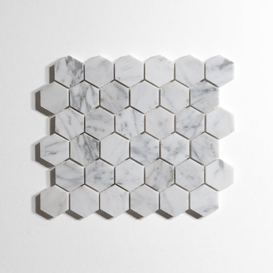 Venatino Carrara honed hexagon marble mosaic on mesh sheet