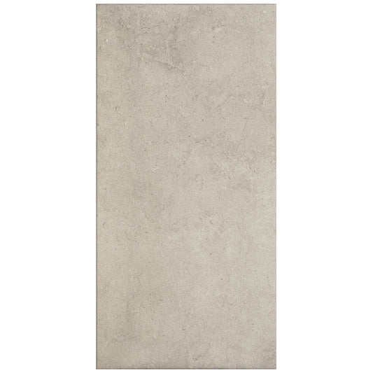 Rectangular tile with a beige color and textured surface on a white background